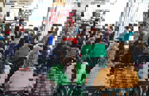 Customers attending a talk at WestLib